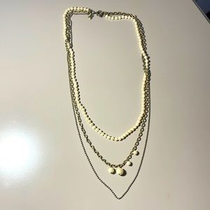 Multi strand Pearl and brushed gold colored necklace